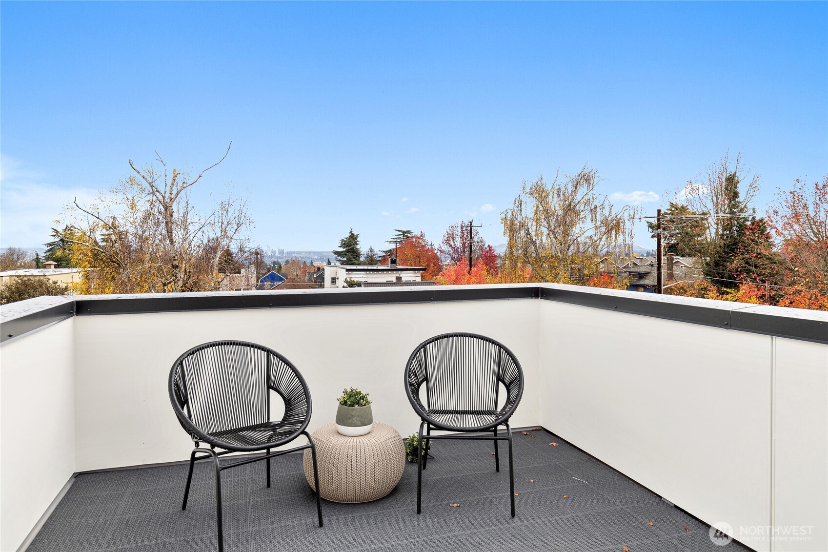311 17th Avenue East Seattle, WA 98112 - Photo 32 of 39 a view of a couches and table in a balcony