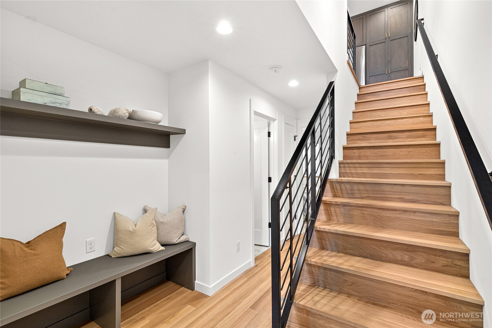 311 17th Avenue East Seattle, WA 98112 - Photo 4 of 39 a view of entryway and hall with wooden floor