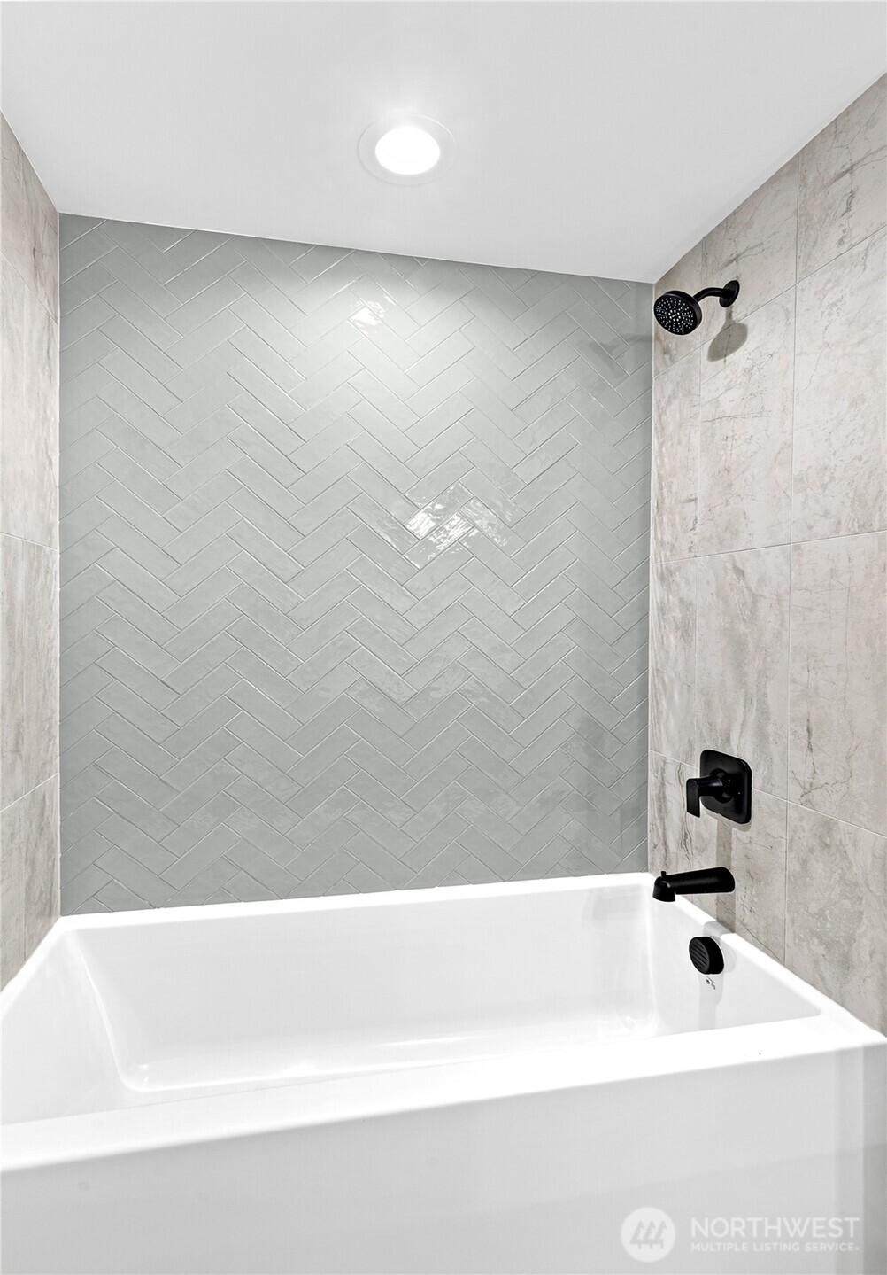 311 17th Avenue East Seattle, WA 98112 - Photo 7 of 39 a bathroom with a bathtub