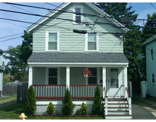 a front view of a house with a porch