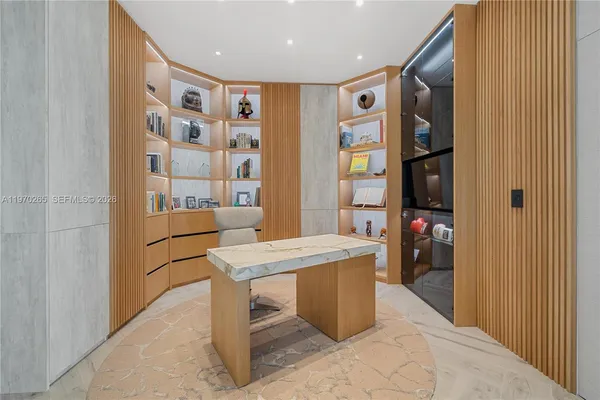 a dining room with a table and chairs