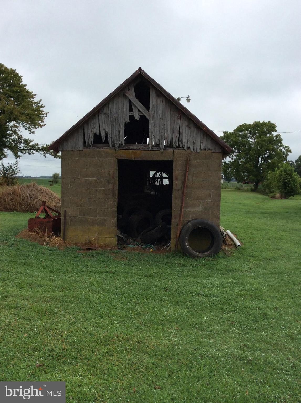 115 Shine Smith Road Chestertown, MD 21620 - Photo 7 of 10 a front view of a house with garden