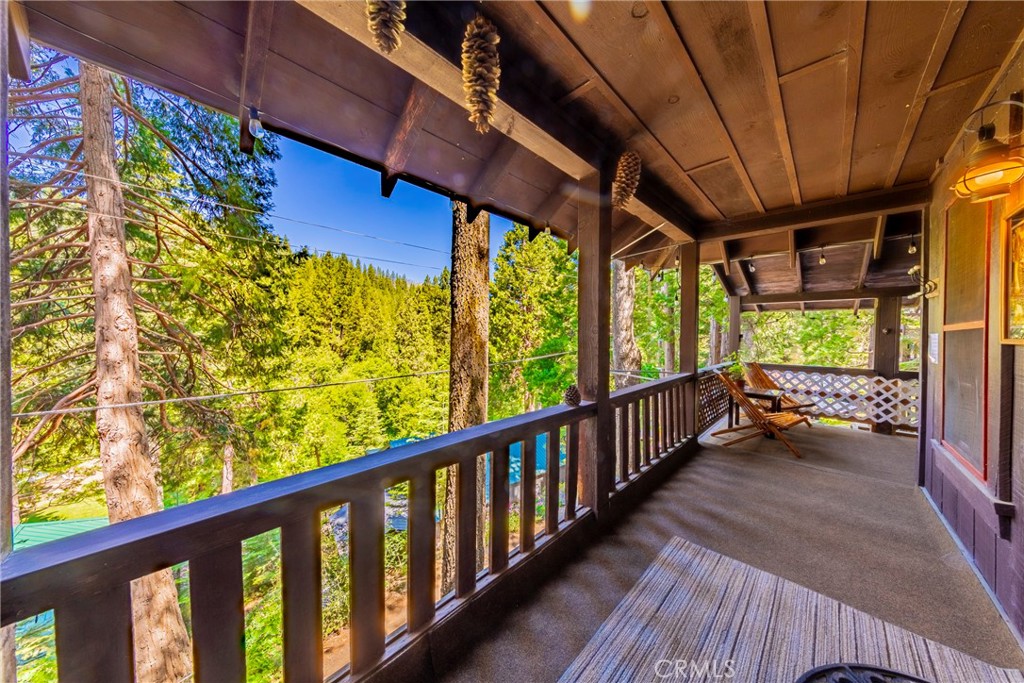 49988 Locust Road Oakhurst, CA 93644 - Photo 4 of 35 a view of porch with wooden floor