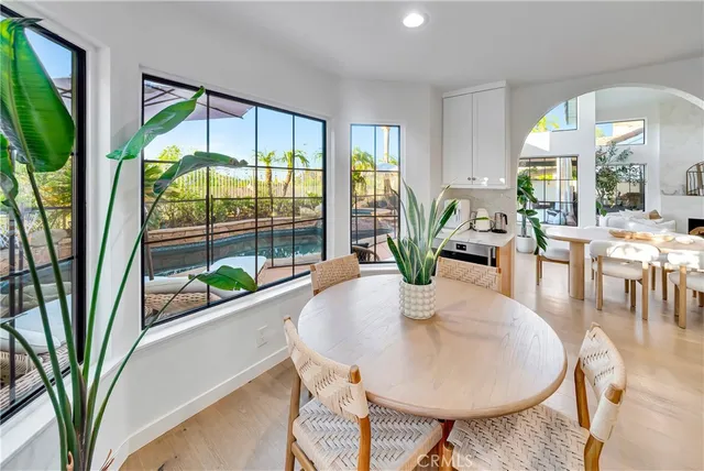 a kitchen with stainless steel appliances granite countertop a granite counter tops and a refrigerator