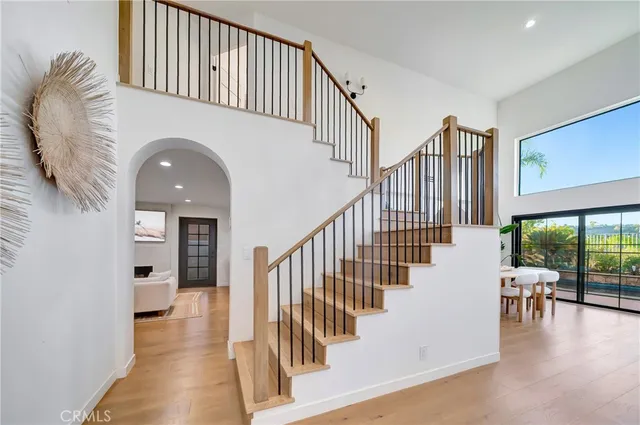 a living room with furniture a rug and a fireplace