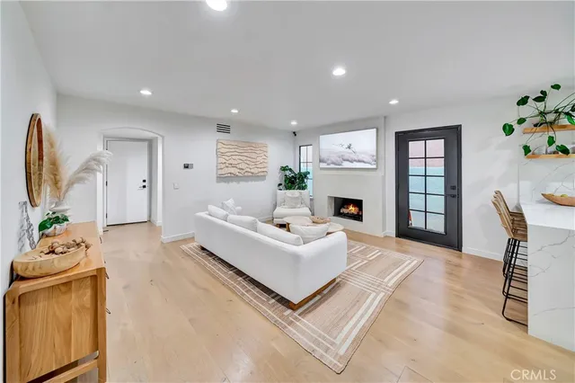 a bedroom with bed and a couch