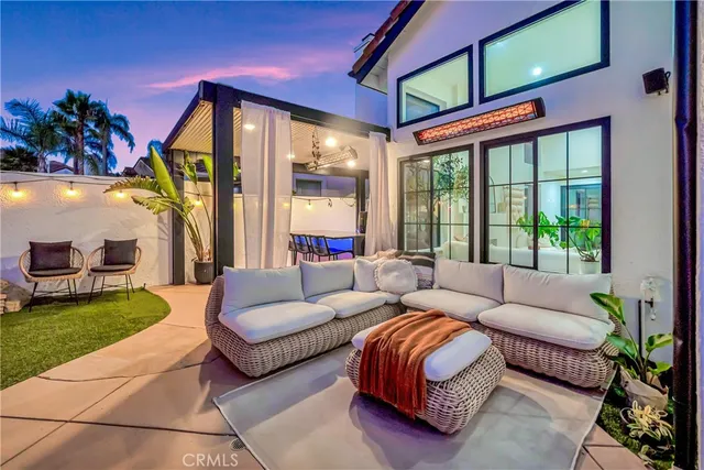 a view of swimming pool with outdoor seating