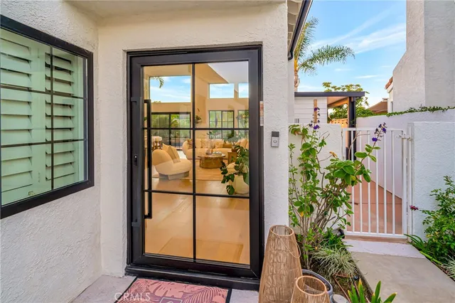 a view of a potted plant in front of a door