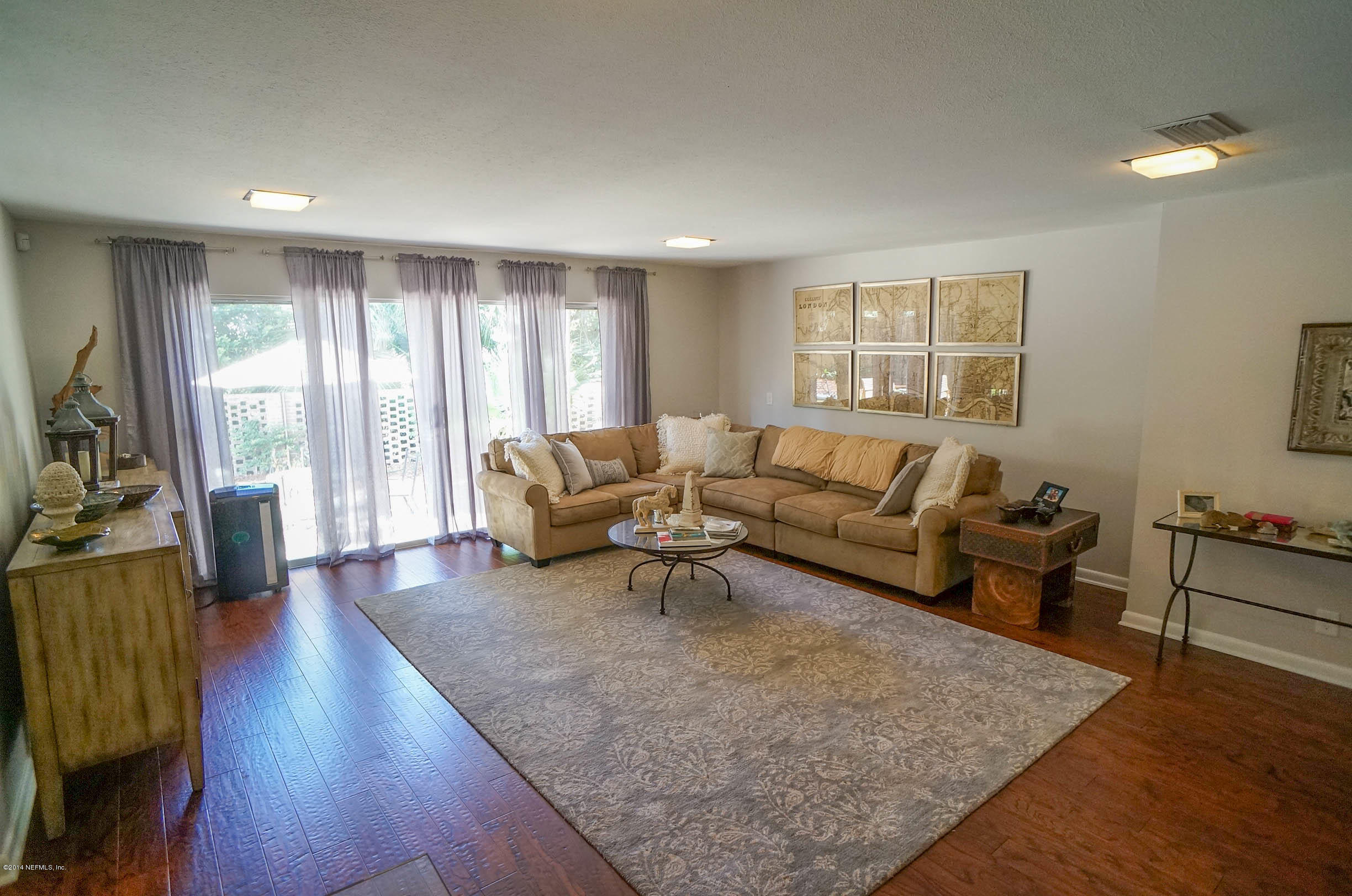 2132 La Vaca Road Jacksonville, FL 32217 - Photo 39 of 42 a living room with furniture and wooden floor