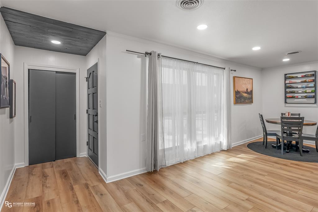 146 Bolinger Hill Road Plain Dealing, LA 71064 - Photo 17 of 32 a view of livingroom with furniture and wooden floor