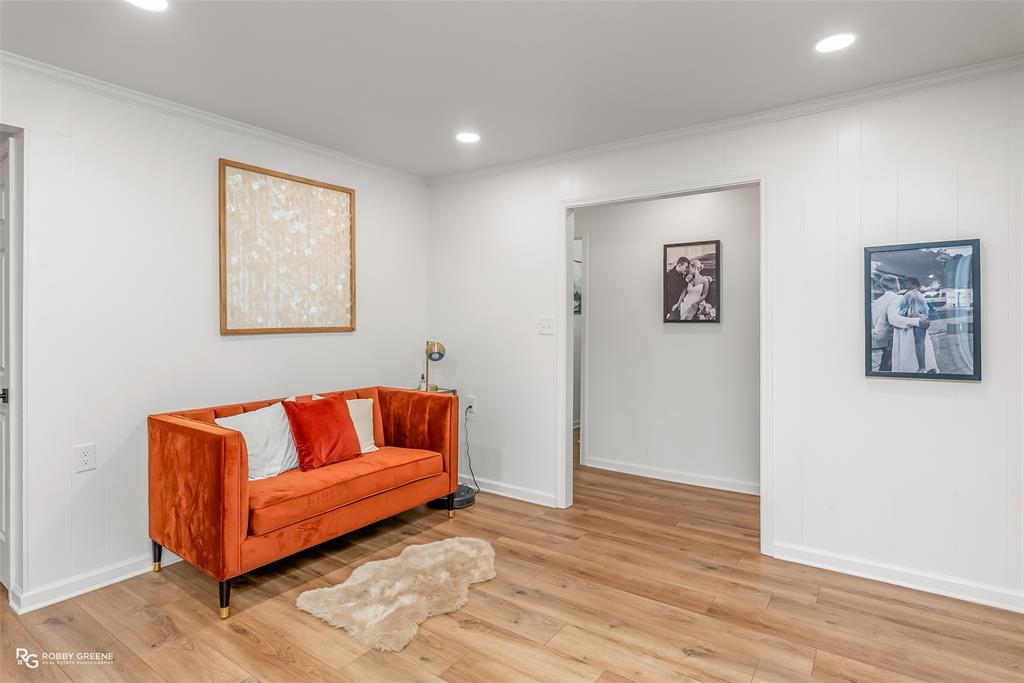 146 Bolinger Hill Road Plain Dealing, LA 71064 - Photo 18 of 32 a white couch sitting in a living room with a couch