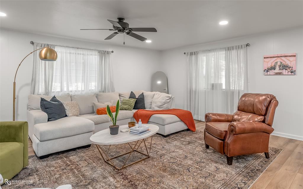 146 Bolinger Hill Road Plain Dealing, LA 71064 - Photo 5 of 32 a living room with furniture and a large window