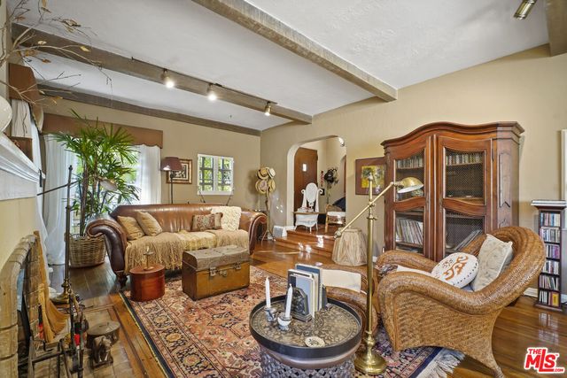 a bathroom with a sink a mirror and a toilet