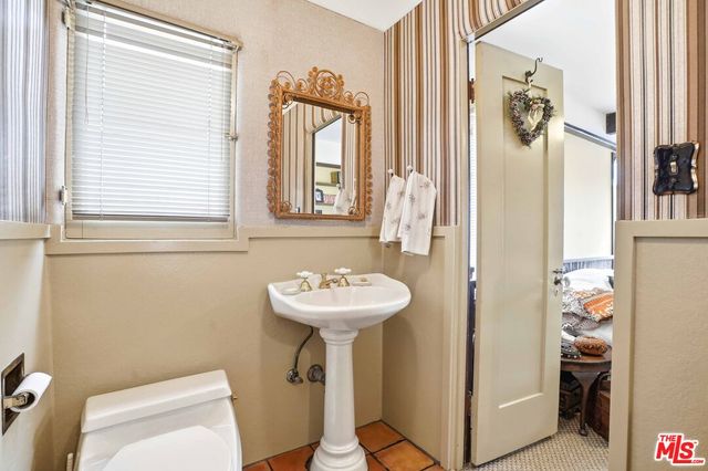 a kitchen with a stove and a sink