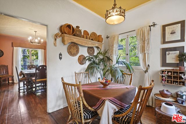 a view of a balcony with wooden floor