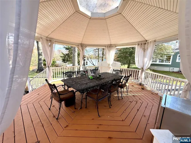 a view of a two chairs in the porch