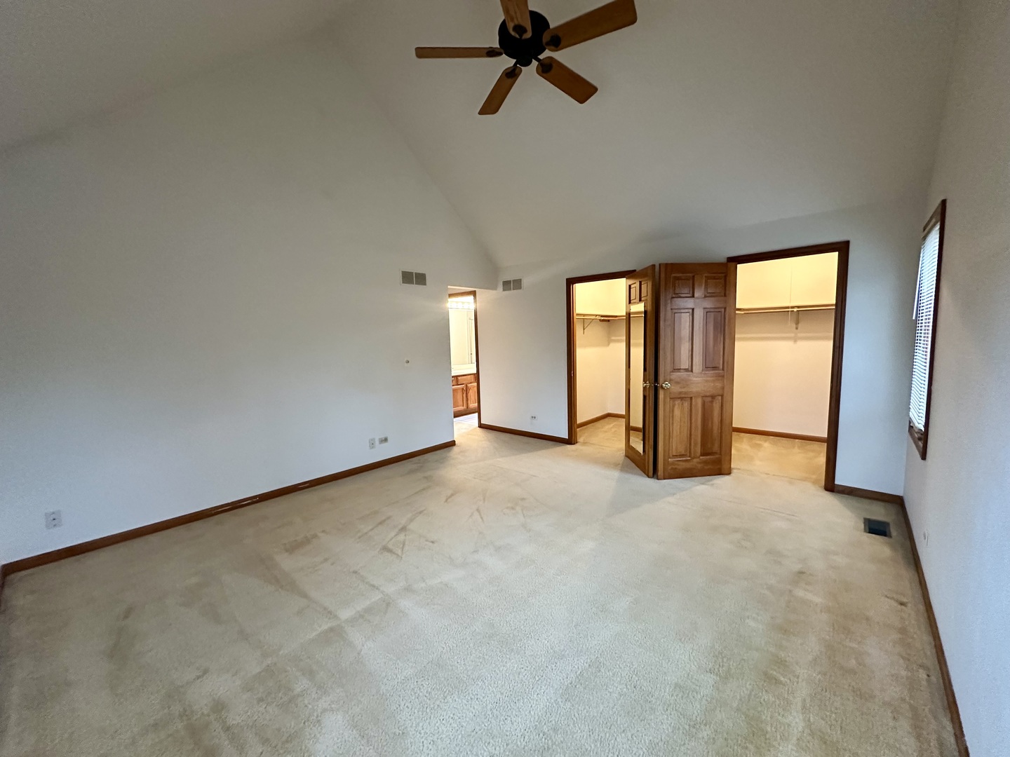 4216 White Ash Road Crystal Lake, IL 60014 - Photo 17 of 34 an empty room with windows and closet