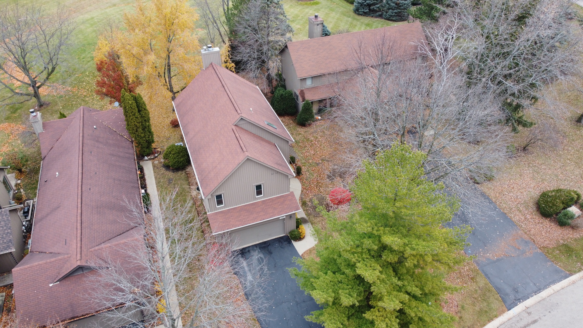 4216 White Ash Road Crystal Lake, IL 60014 - Photo 3 of 34 an aerial view of house with outdoor space