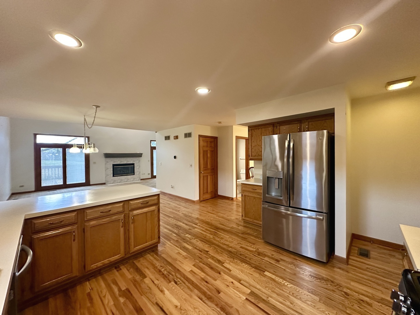 4216 White Ash Road Crystal Lake, IL 60014 - Photo 4 of 34 a kitchen with stainless steel appliances a refrigerator and a stove top oven