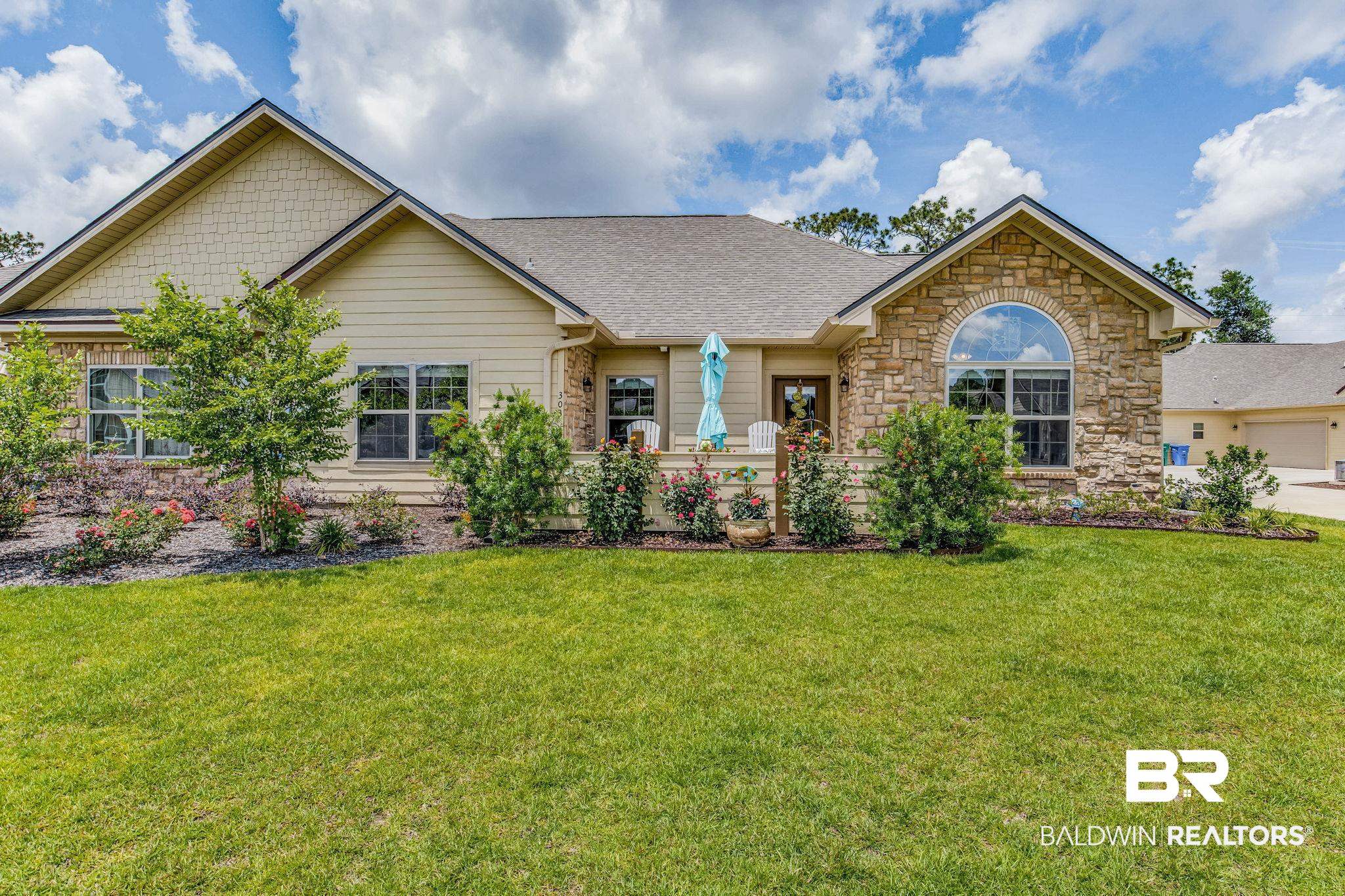 303 Holmes Avenue, Unit 303 Foley, AL 36535 - Photo 35 of 44 Lawn maintenance covered by COA