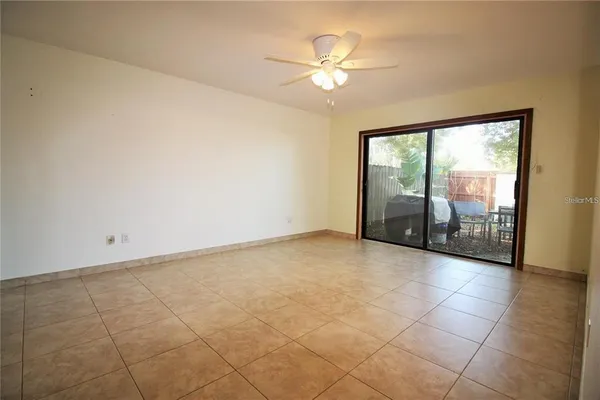 an empty room with a bathroom