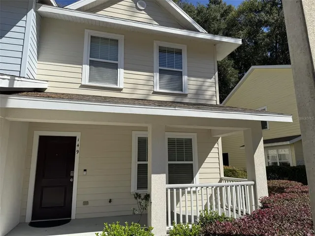 a view of a house with a small porch