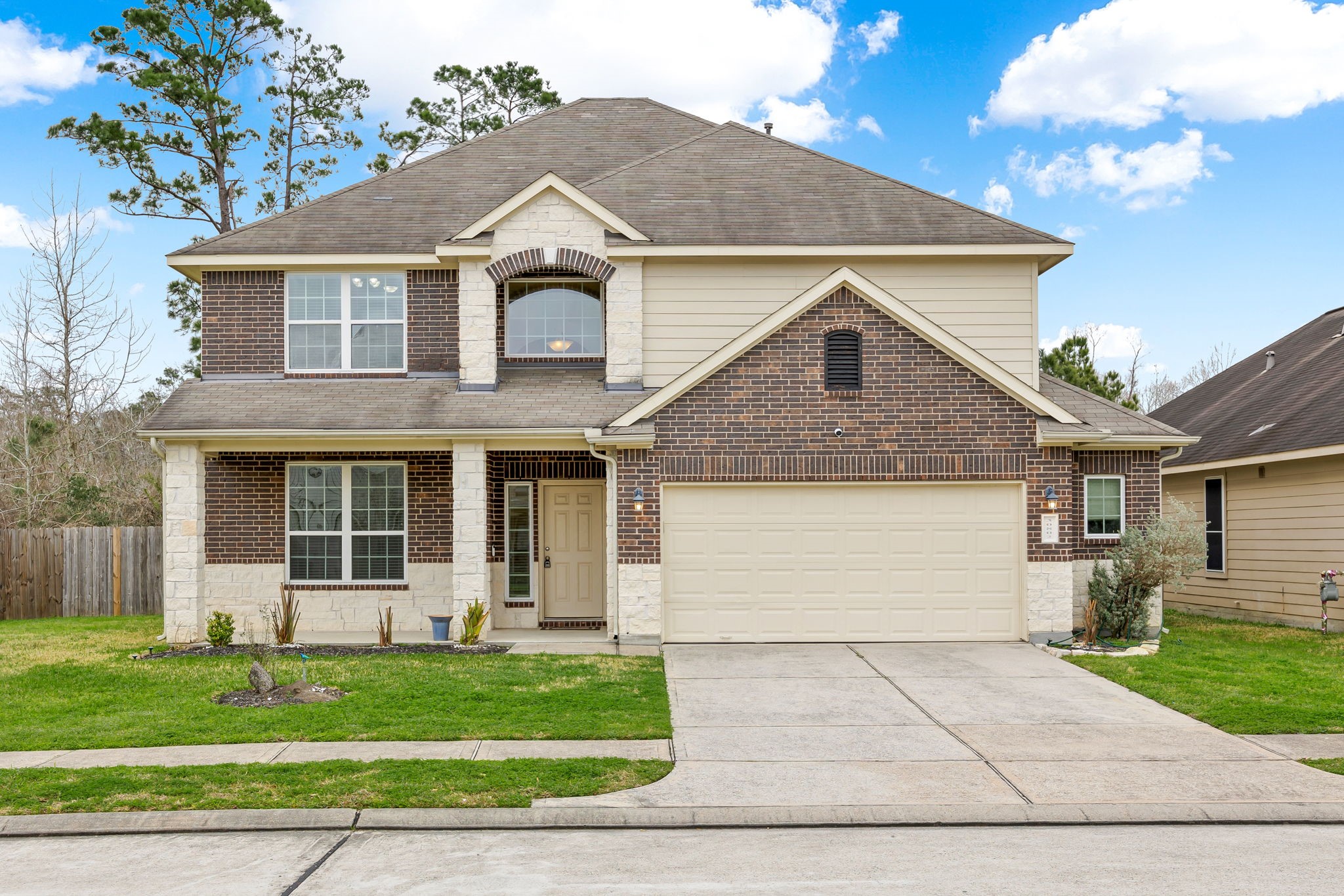 30802 Lavender Trace Drive Spring, TX 77386 - Photo 1 of 30 a front view of a house with a yard