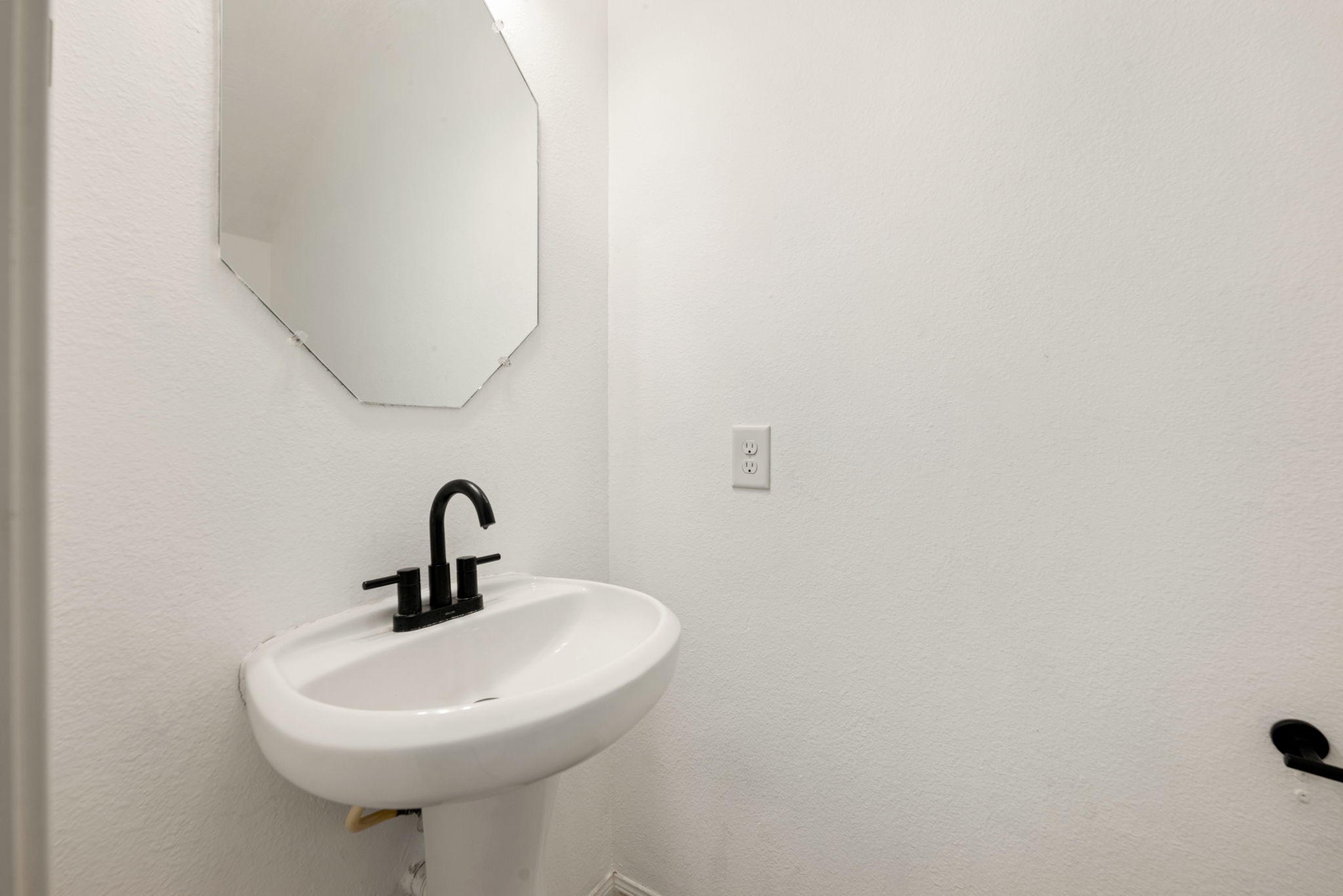 30802 Lavender Trace Drive Spring, TX 77386 - Photo 12 of 30 a bathroom with a sink and mirror