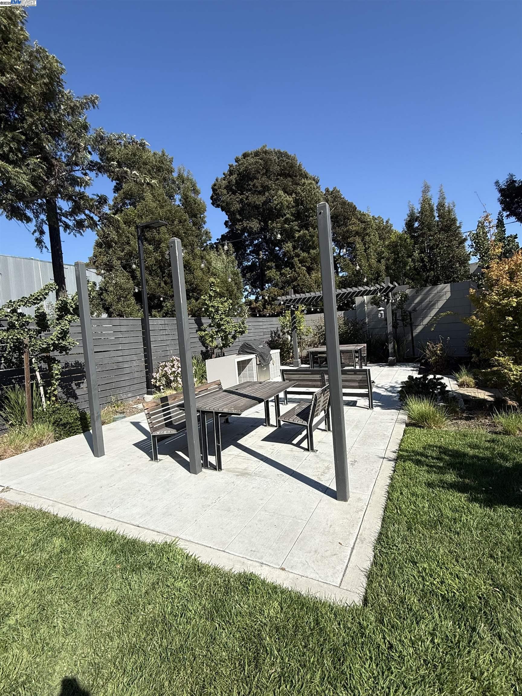 3957 Wattling Street Oakland, CA 94601 - Photo 23 of 23 a view of a backyard with sitting area