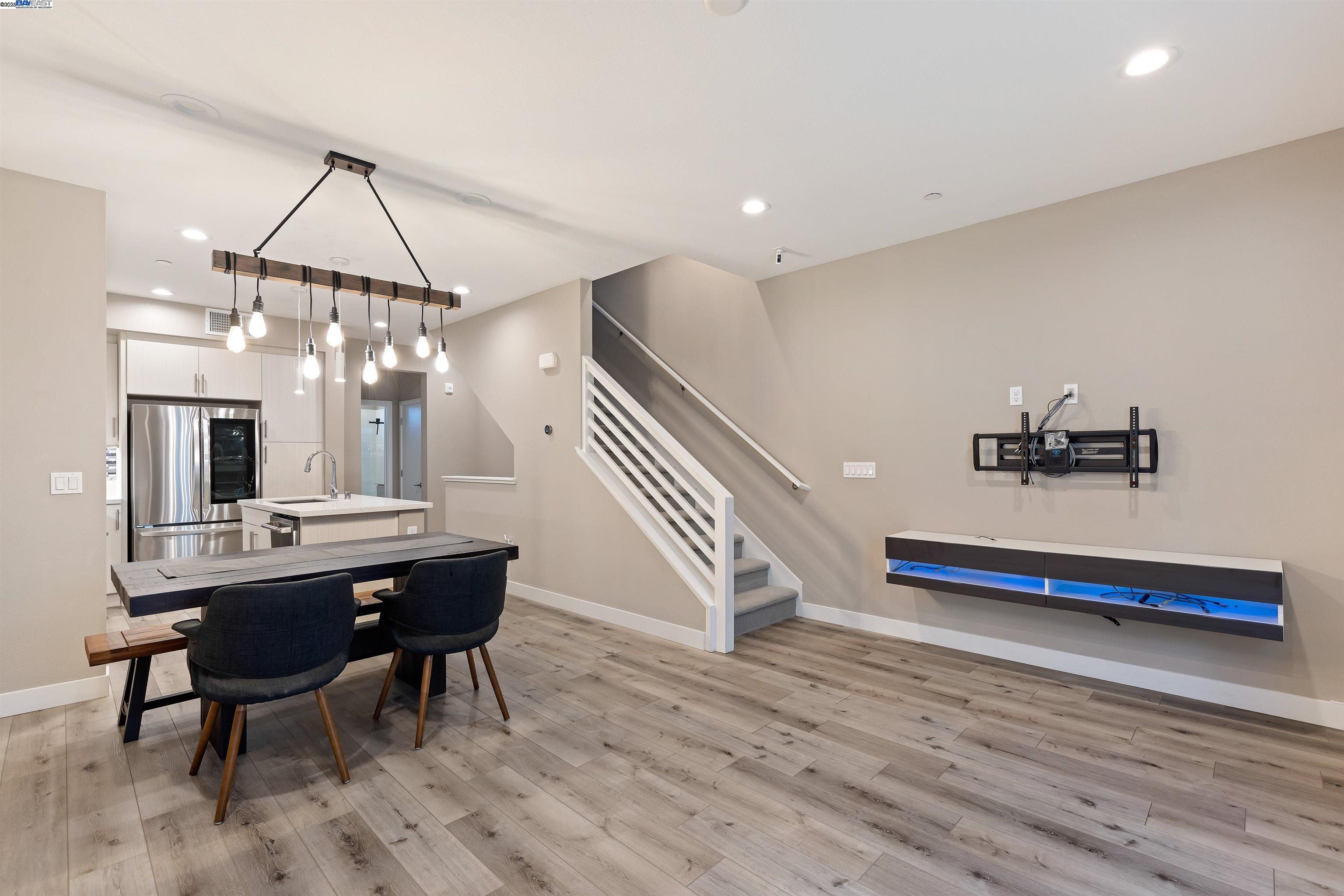 3957 Wattling Street Oakland, CA 94601 - Photo 3 of 23 a view of a room with furniture and wooden floor