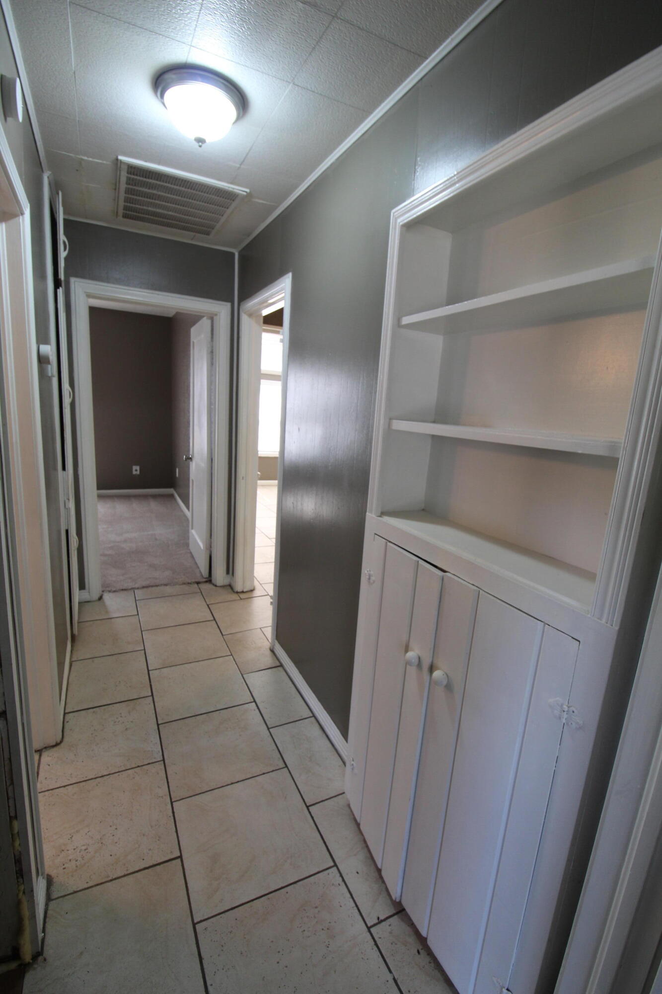 2209 25th Street Lubbock, TX 79411 - Photo 13 of 22 a view of an empty walk in closet