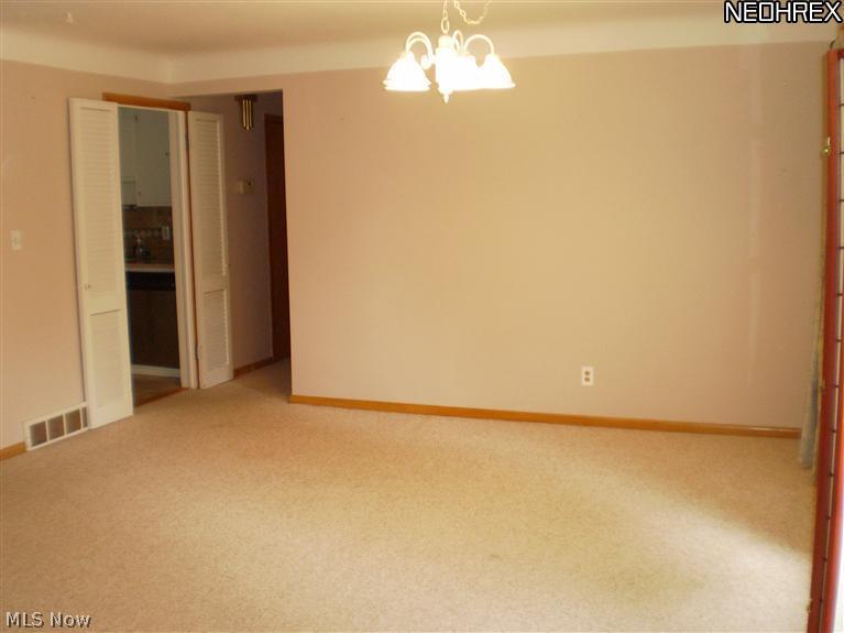 1167 Hansford Road Lyndhurst, OH 44124 - Photo 7 of 12 Dining Room with L shaped Living Room.