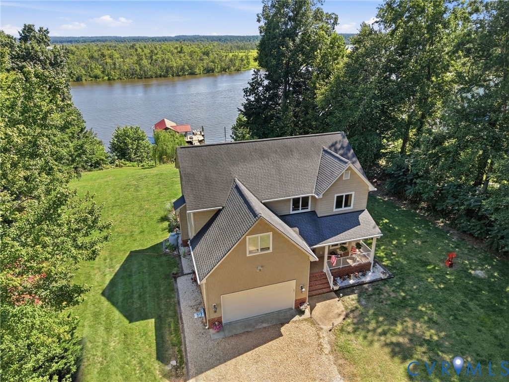 210 Riverview Road Stevensville, VA 23161 - Photo 62 of 63 Waterfront property featuring a beige exterior, a