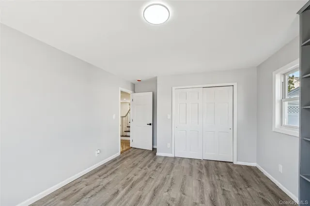 a bathroom with a toilet sink and shower