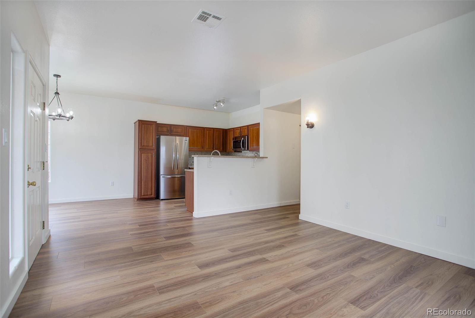 8457 South Thunder Ridge Way, Unit 103 Highlands Ranch, CO 80126 - Photo 3 of 27