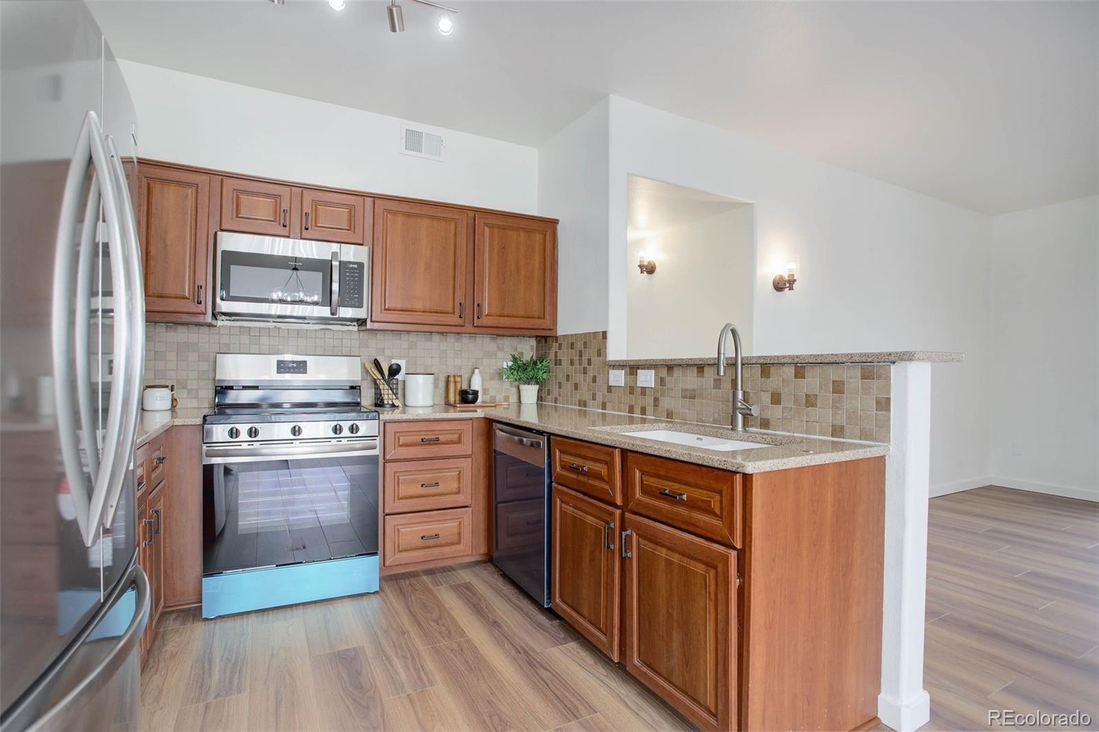 8457 South Thunder Ridge Way, Unit 103 Highlands Ranch, CO 80126 - Photo 5 of 27