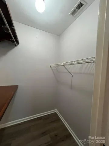 a view of a room with racks on the wall