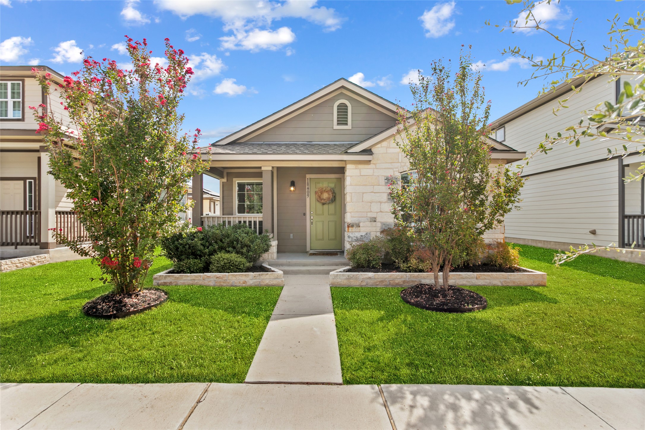 18409 Congaree Street Pflugerville, TX 78660 - Photo 1 of 1 a front view of a house with a yard
