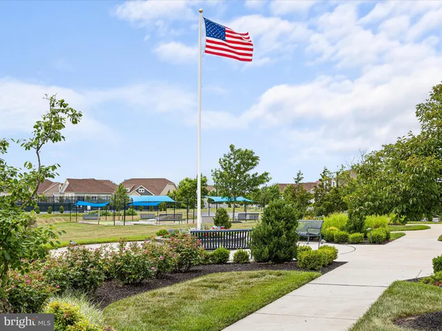a front view of a building with garden