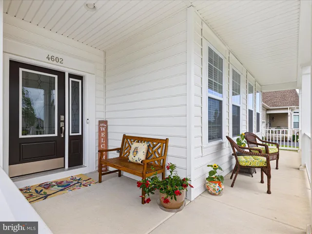 a bench sitting in front of a building