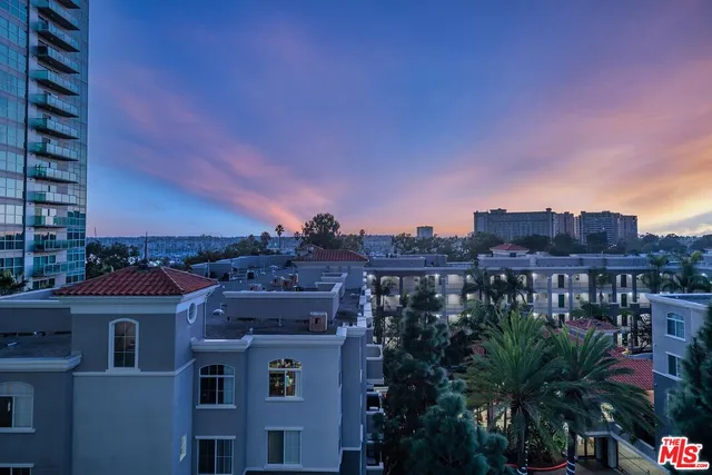 a view of a city with tall buildings