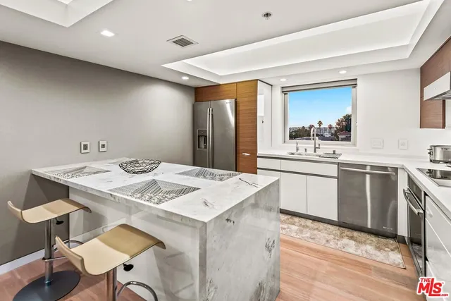 a view of a kitchen area with furniture and kitchen view