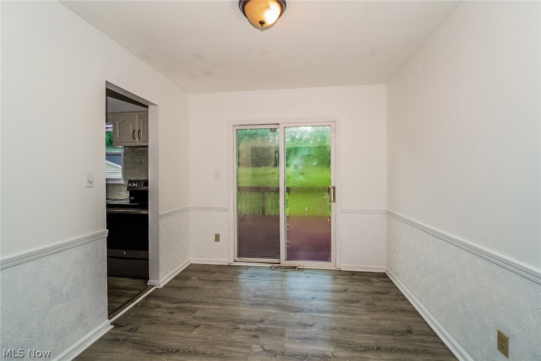 2508 Primewood Road Akron, OH 44305 - Photo 5 of 20 Doorway with dark hardwood / wood-style floors