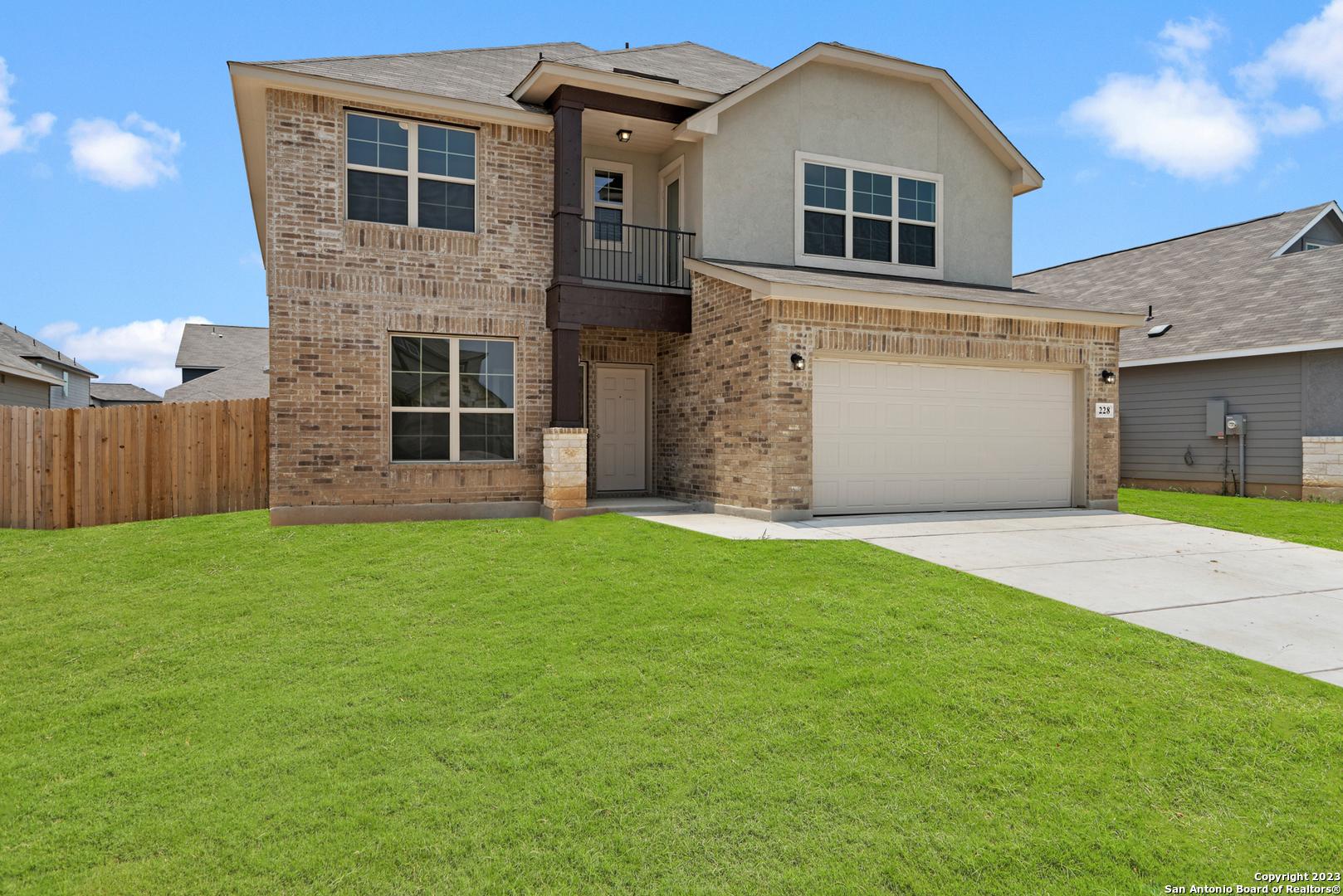 a view of a house with a garden