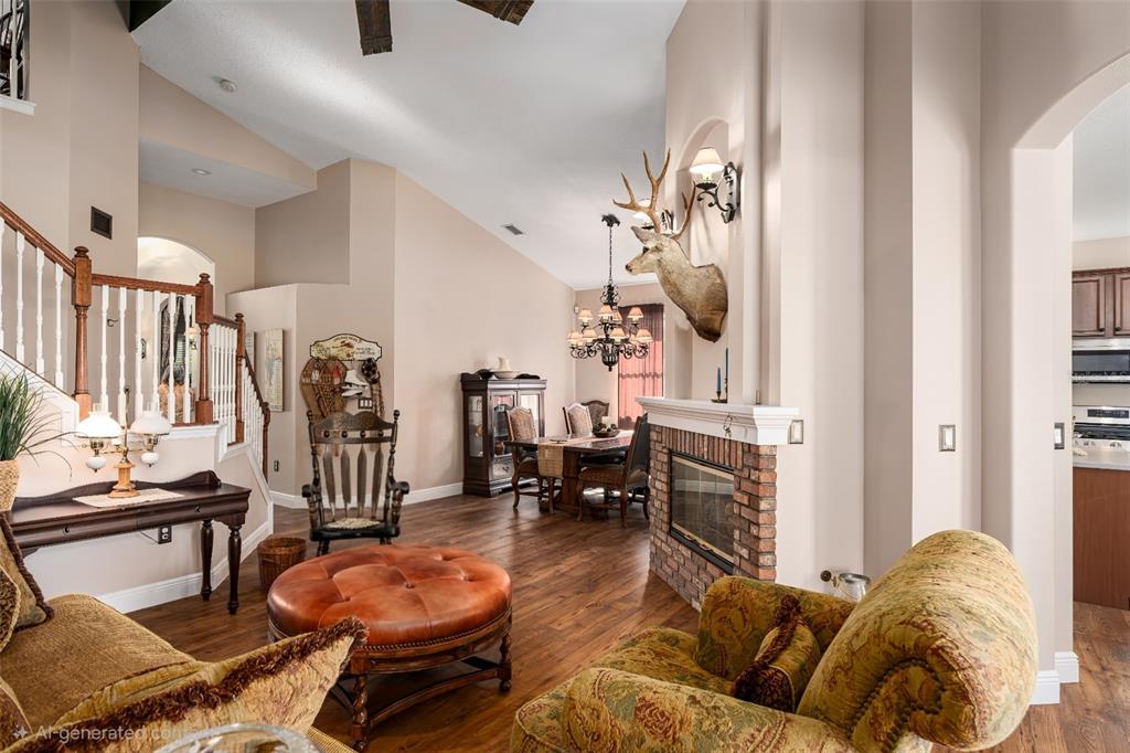 6552 Tailfeather Way Bradenton, FL 34203 - Photo 13 of 65 a living room with furniture and wooden floor