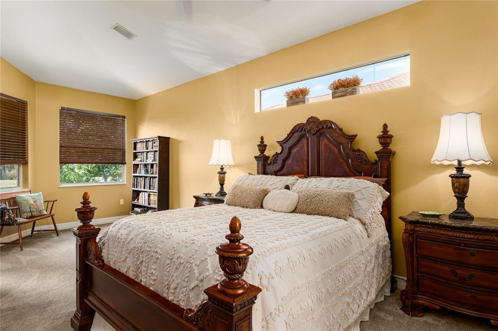 6552 Tailfeather Way Bradenton, FL 34203 - Photo 22 of 65 a bedroom with a bed and window