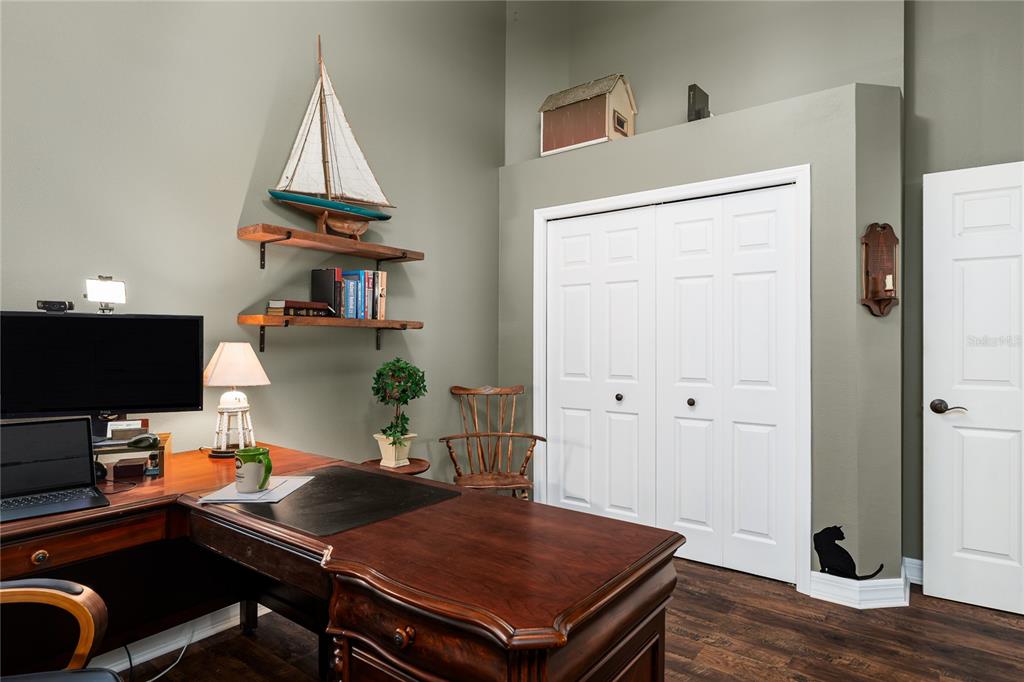 6552 Tailfeather Way Bradenton, FL 34203 - Photo 29 of 65 a room with furniture and a window