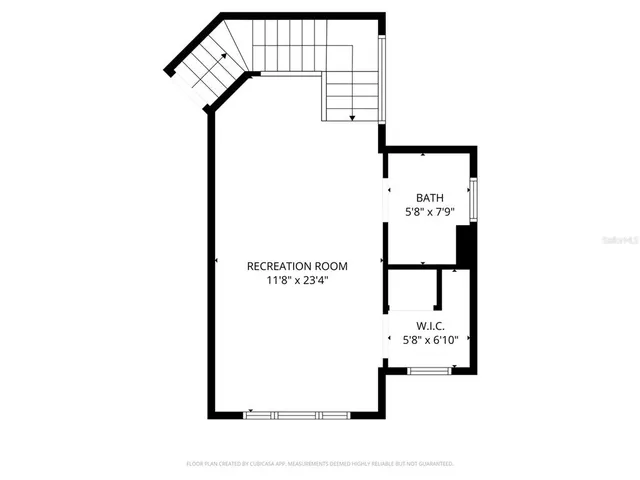 a front view of a house with a garden and plants