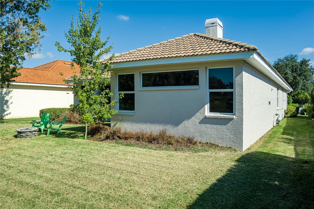 6552 Tailfeather Way Bradenton, FL 34203 - Photo 38 of 65 a front view of house with yard