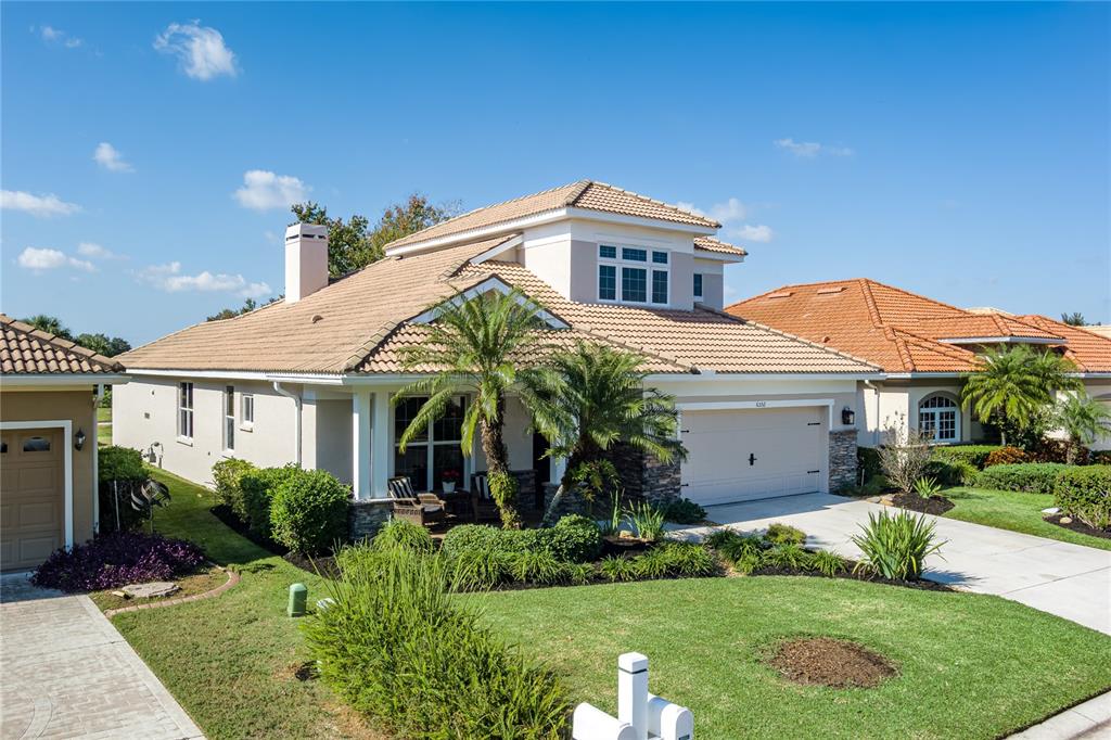 6552 Tailfeather Way Bradenton, FL 34203 - Photo 40 of 65 a front view of a house with a yard